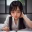 传媒学者Tina的头像，短发女性学者